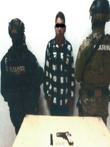 Portaba arma de fuego