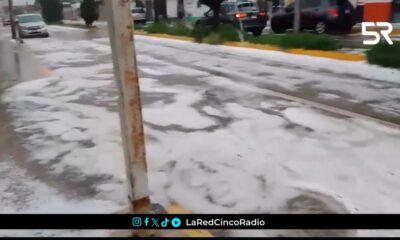 San Martín Texmelucan sufre estragos por granizada: calles inundadas, techos derrumbados y cierres viales en puentes El Moral y Santa Catarina Hueyatzacoalco.